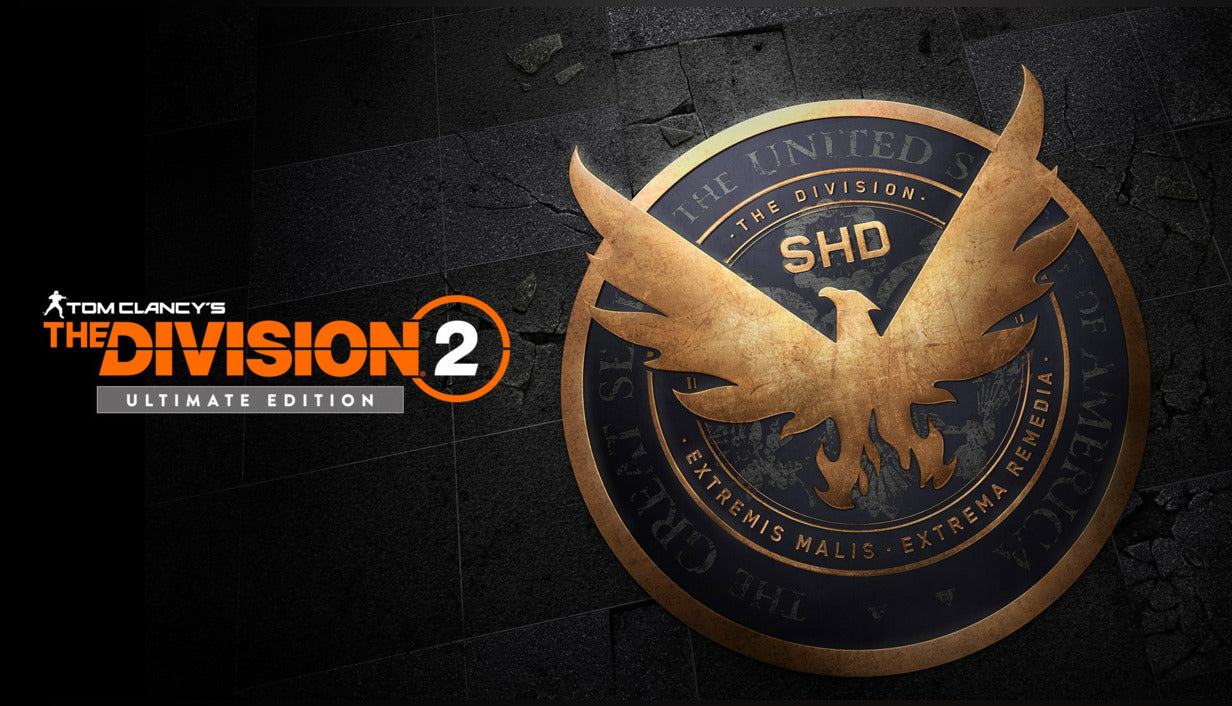 Cover art for Tom Clancy's The Division 2 - Ultimate Edition, presenting a metallic gold Strategic Homeland Division eagle emblem resting on dark, cracked stone tiles.
