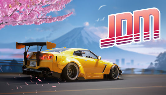 JDM: Japanese Drift Master cover art featuring a yellow customized sports car drifting past cherry blossoms with Mount Fuji behind it.