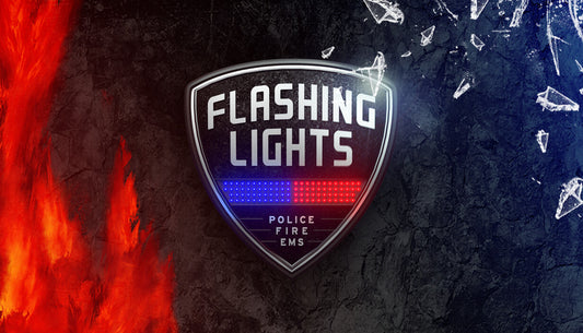 Official cover art for Flashing Lights - Police Fire EMS showing emergency vehicles and personnel in action.